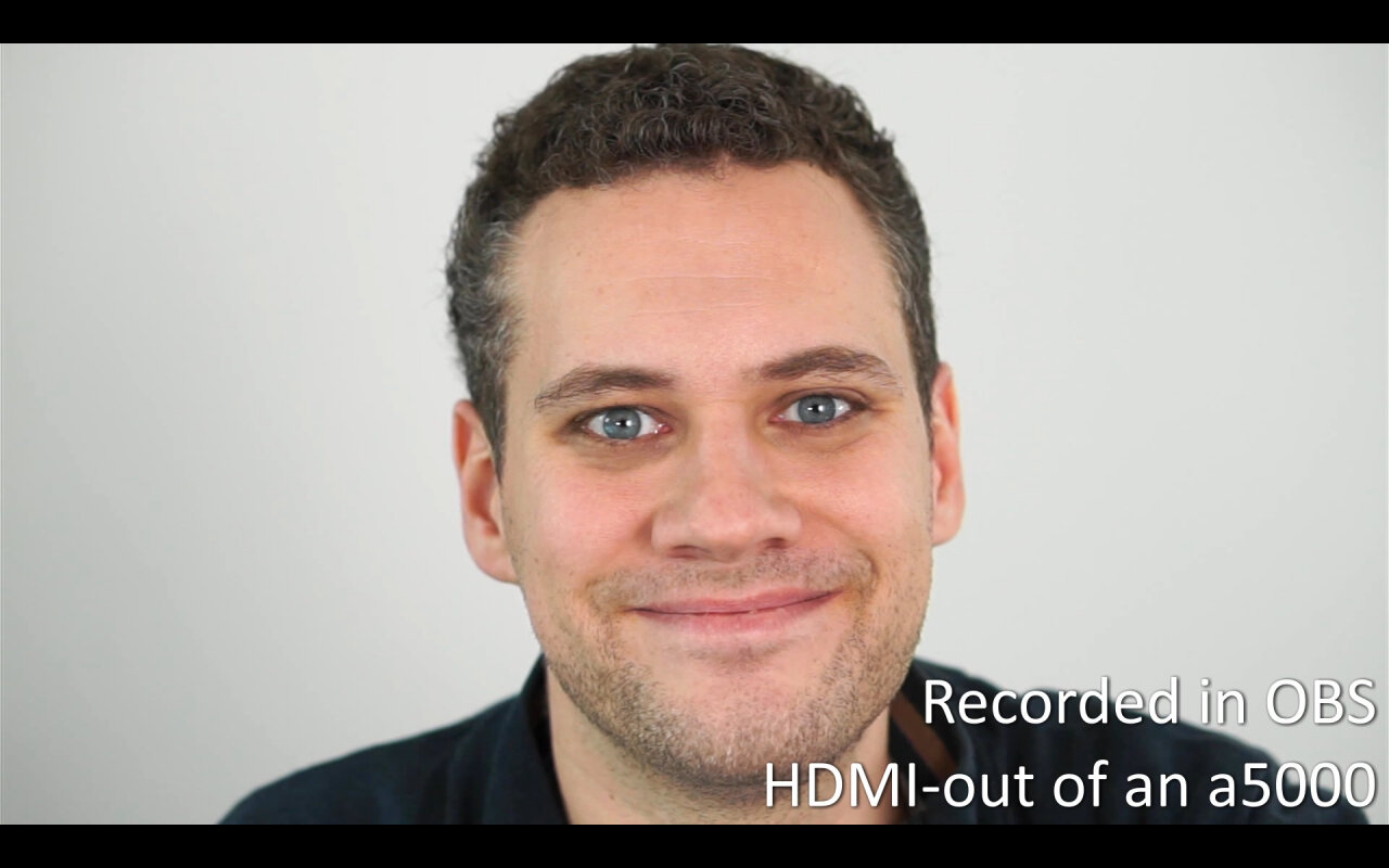 Recording from the a5000 showing an image of me looking into the camera. The image is clear, has no user interface and the skin has a natural look.