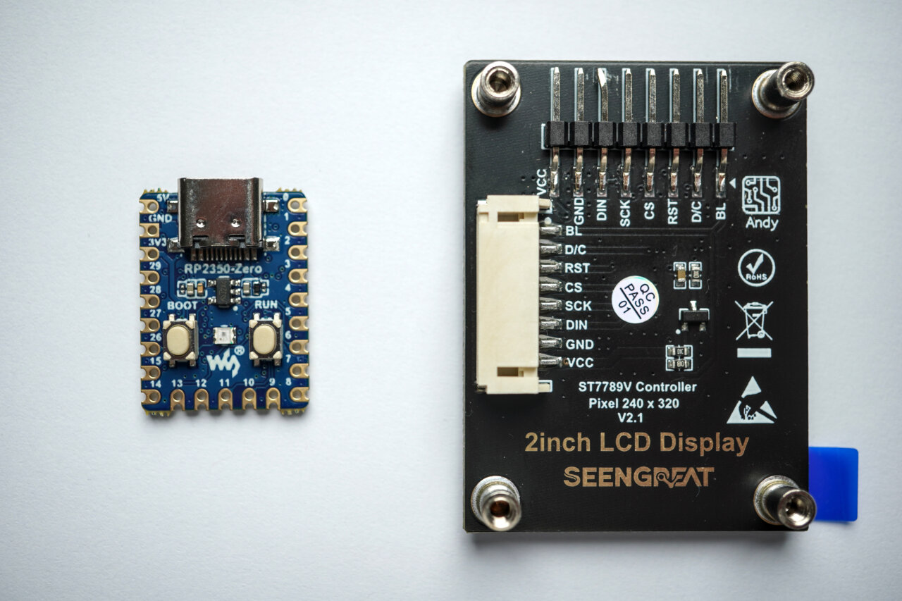 Photo of two components. On the left there is a small rp2350-zero microcontroller, which has a USB-C port and an overall size of roughly a thumb. On the right is the backside of the LCD display with several pin header contacts and markings giving the manufacturer Seengreat, the display's resolution of 320x240 pixels, the ST77889V controler and several additional labels..